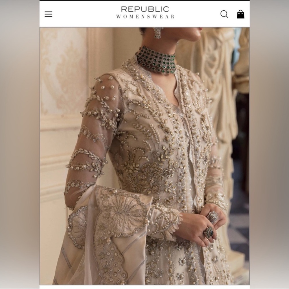 Elegant White and Gold Embellished designer dress